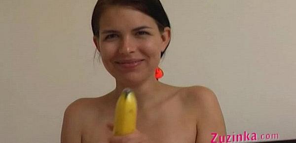  How-to Young brunette girl teaches using a banana